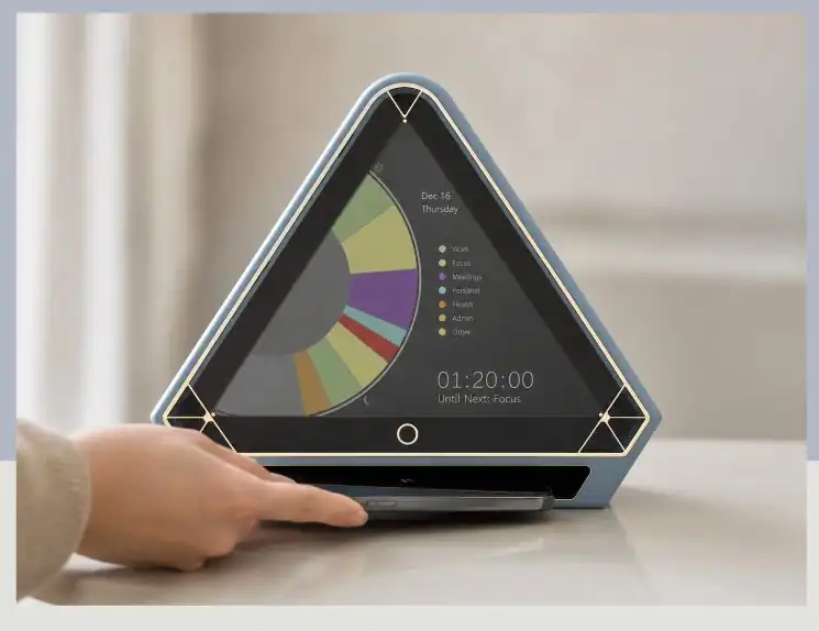 A hand sliding a phone into the device's front slot while the screen shows a colour-coded day wheel and a countdown.