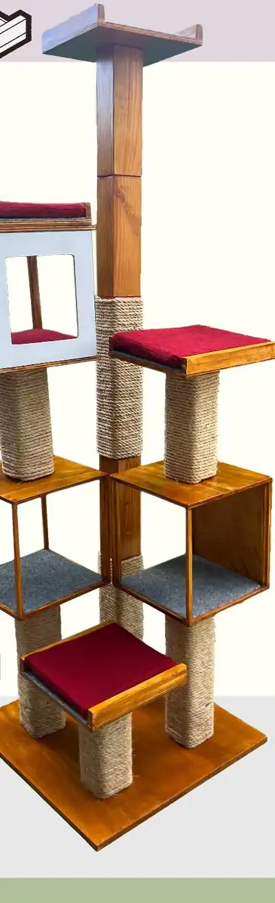 Full modular cat tree with stacked cubes, red cushioned platforms and rope-wrapped posts on a wooden base.